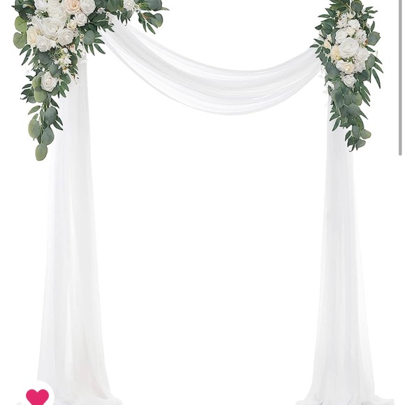 Wedding arch decor flowers and drapes